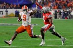 9 Travis Etienne CFP-Fiesta-Bowl-Football-1-2.jpg