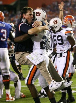 Muschamp_leaping_into_players_arms.jpg